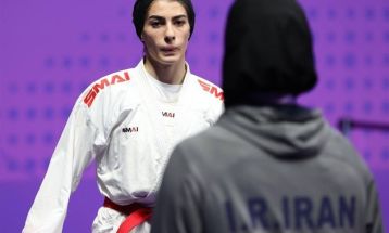 جلوس بانوی کرمانشاهی روی سکوی قهرمانی جهان